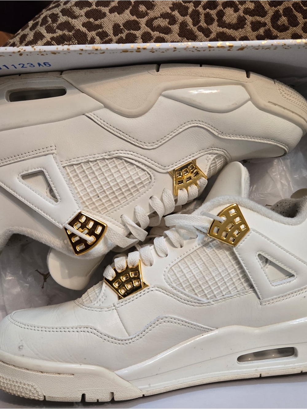 Jordan Women’s White Sneakers with Gold Hardware